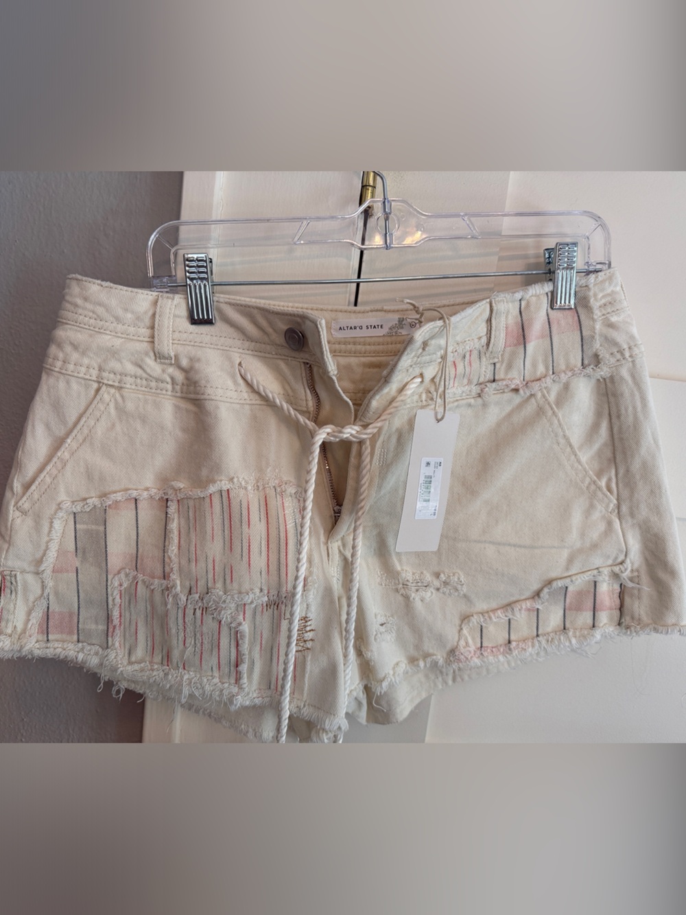 Altar'd State Cream Denim Shorts with Pink and Gray Stripe Insets